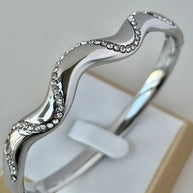 armreif wellenform gold silber