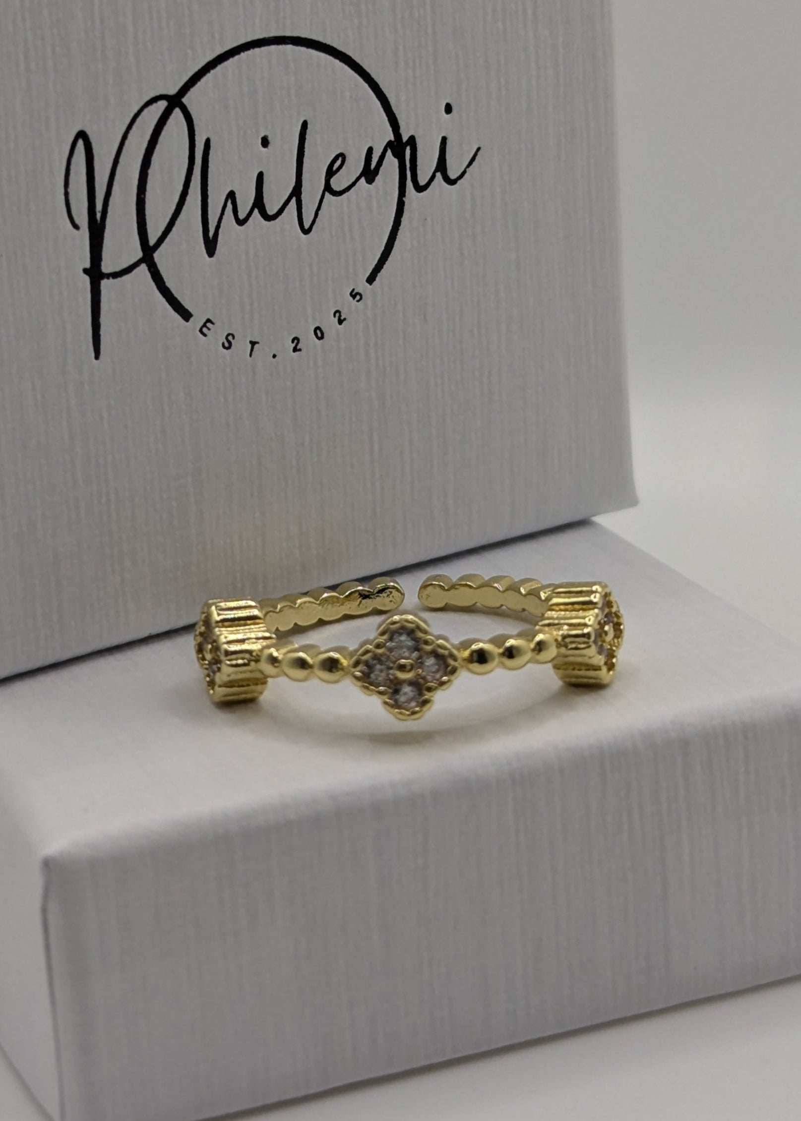 ring glitzer mit steinen kleeblatt